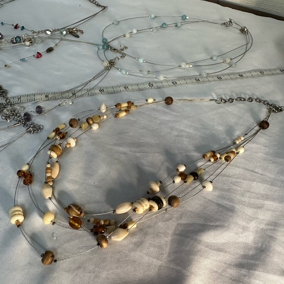 Nine infinity vibe necklaces in many colors - Picture 12 of 12